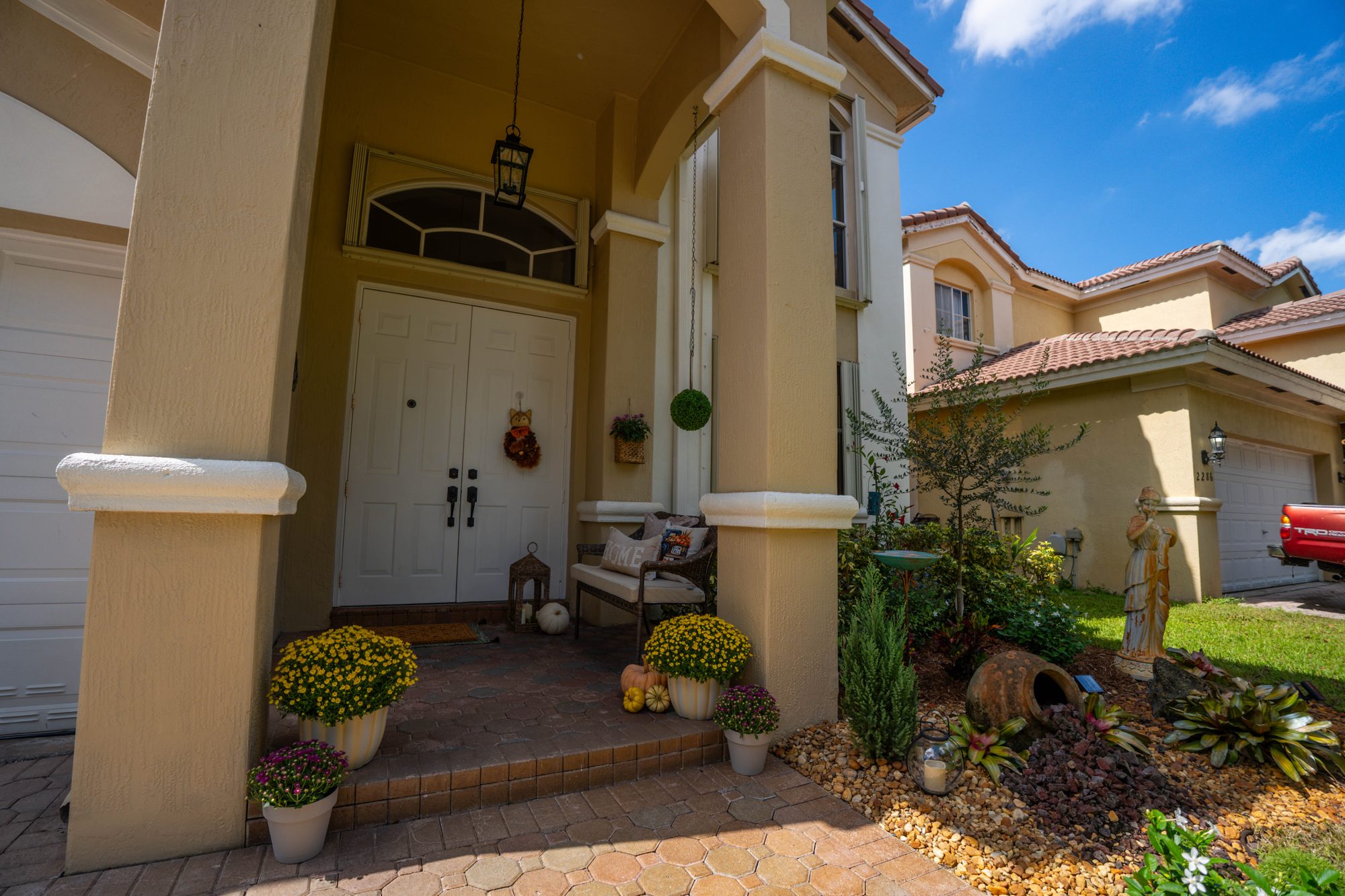 Covered front entry with double doors