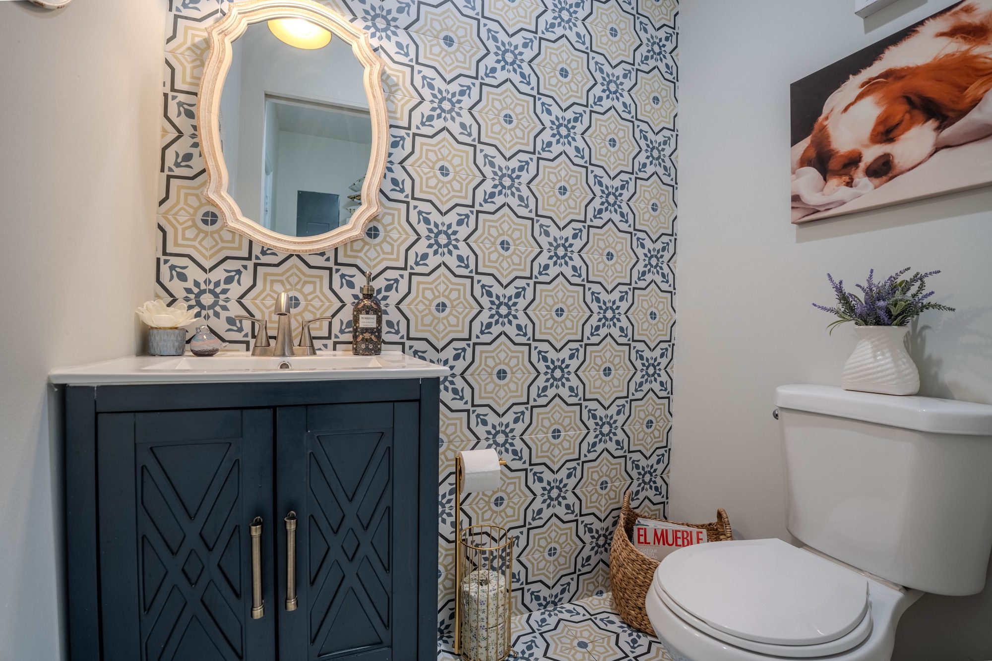 Designer bathroom with tile accent wall